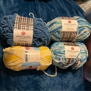 Lot of 4 skeins total. 3 Stitch Studio & 1 skein Bernat Baby Bundle,